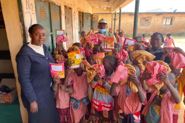 Corps Member Donates School Uniform, Books To Pupils In Jos